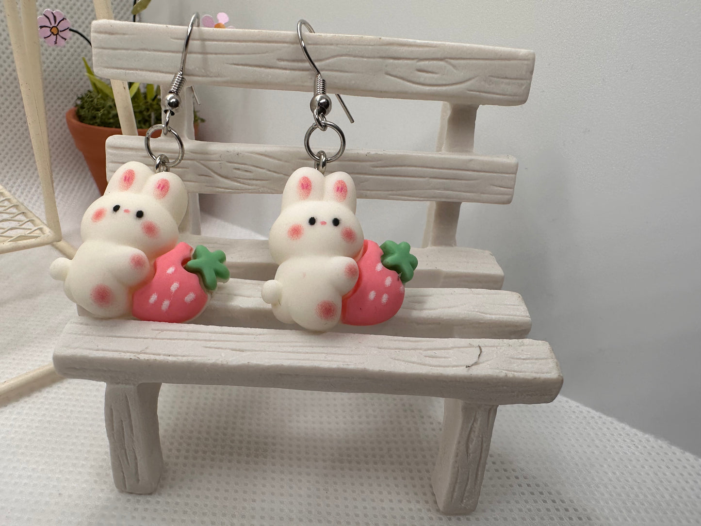 Bunny with pink strawberry earring